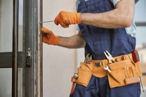 Man repairing door